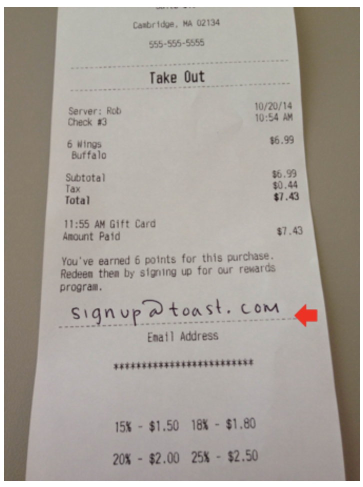 Toast Loyalty sign up on a printed receipt.