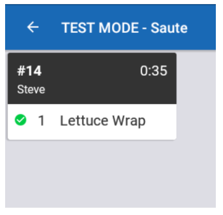 Saute station screen with a green checkmark next to Lettuce Wrap